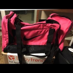 Hot pink nike duffel bag!